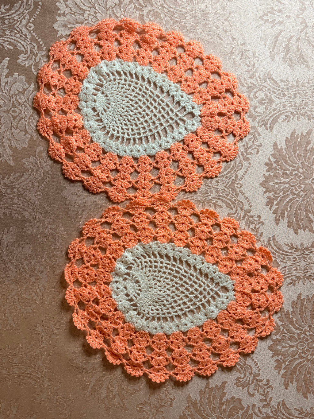 2-Handmade oval crochet doilies