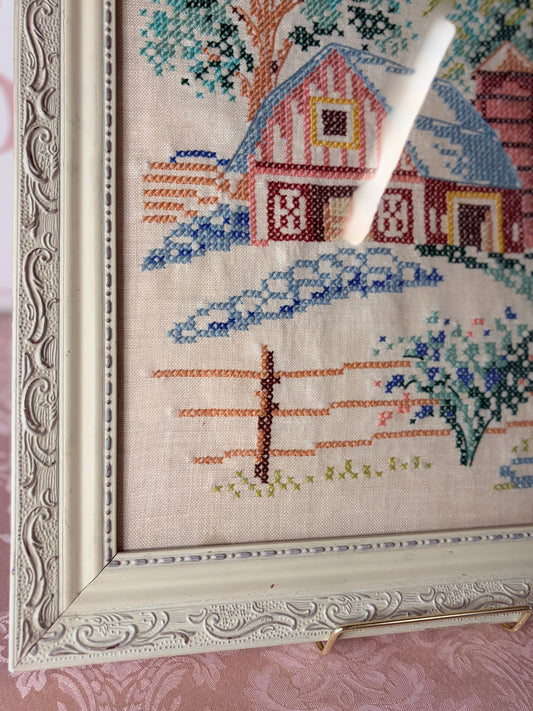 Vintage hand-stitched cross-stitch