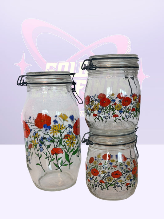 R. Carman “Wild Poppy” Arc France glass canisters