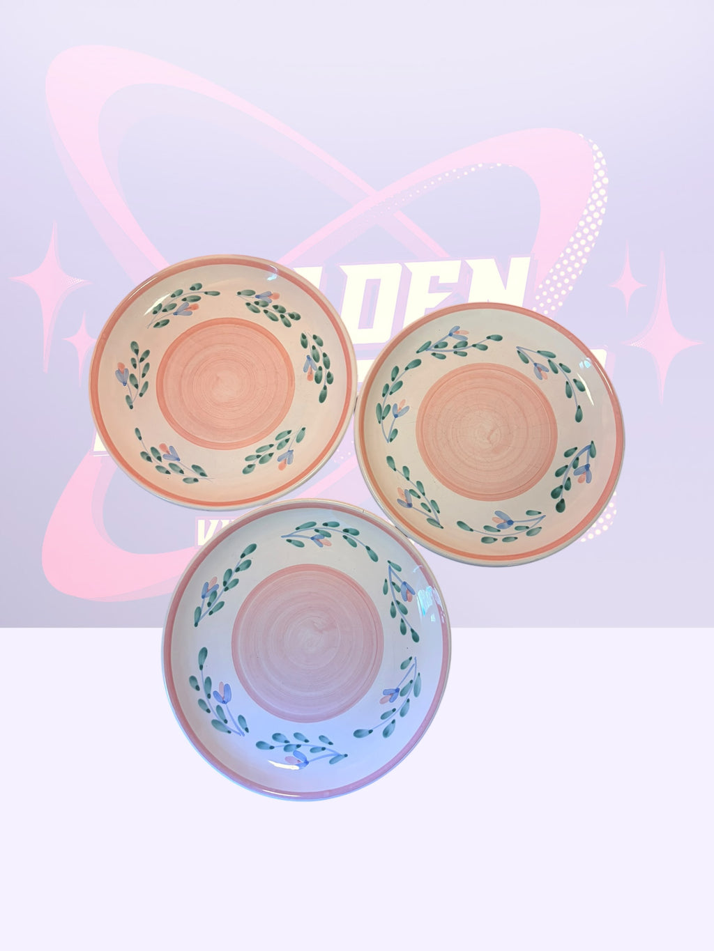 Caleco “Pink Garland” pasta bowls and dinner plates