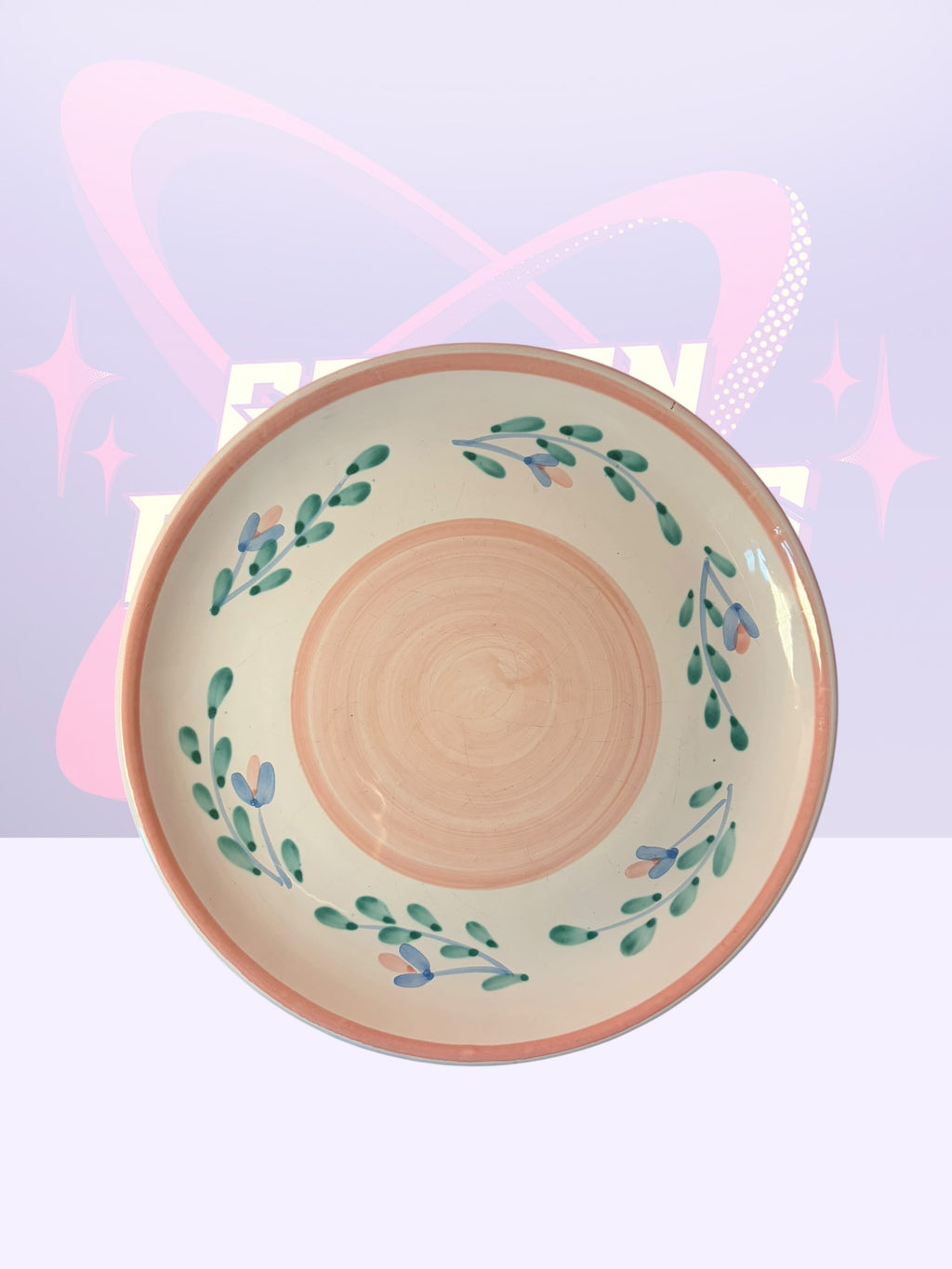 Caleco “Pink Garland” pasta bowls and dinner plates