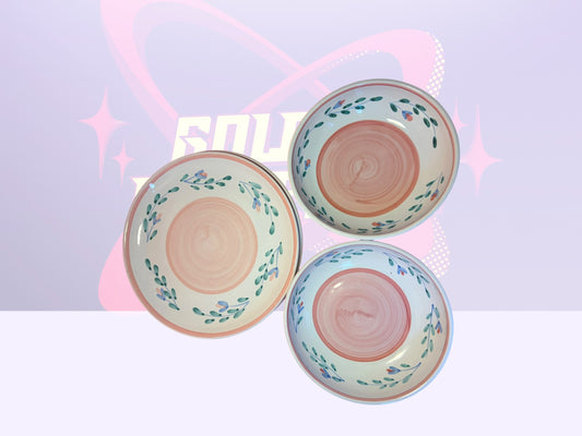 Caleco “Pink Garland” pasta bowls and dinner plates